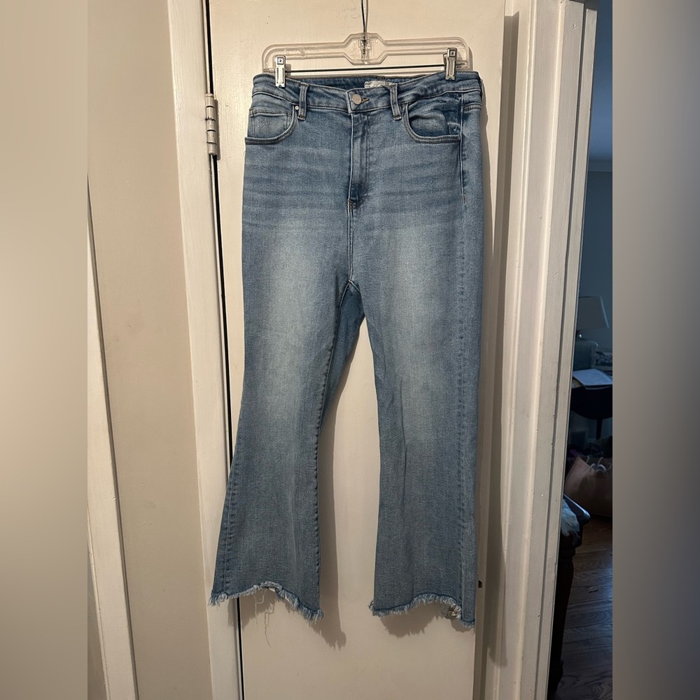 High-Rise Light Blue Cropped Flare Jeans with Raw Hem